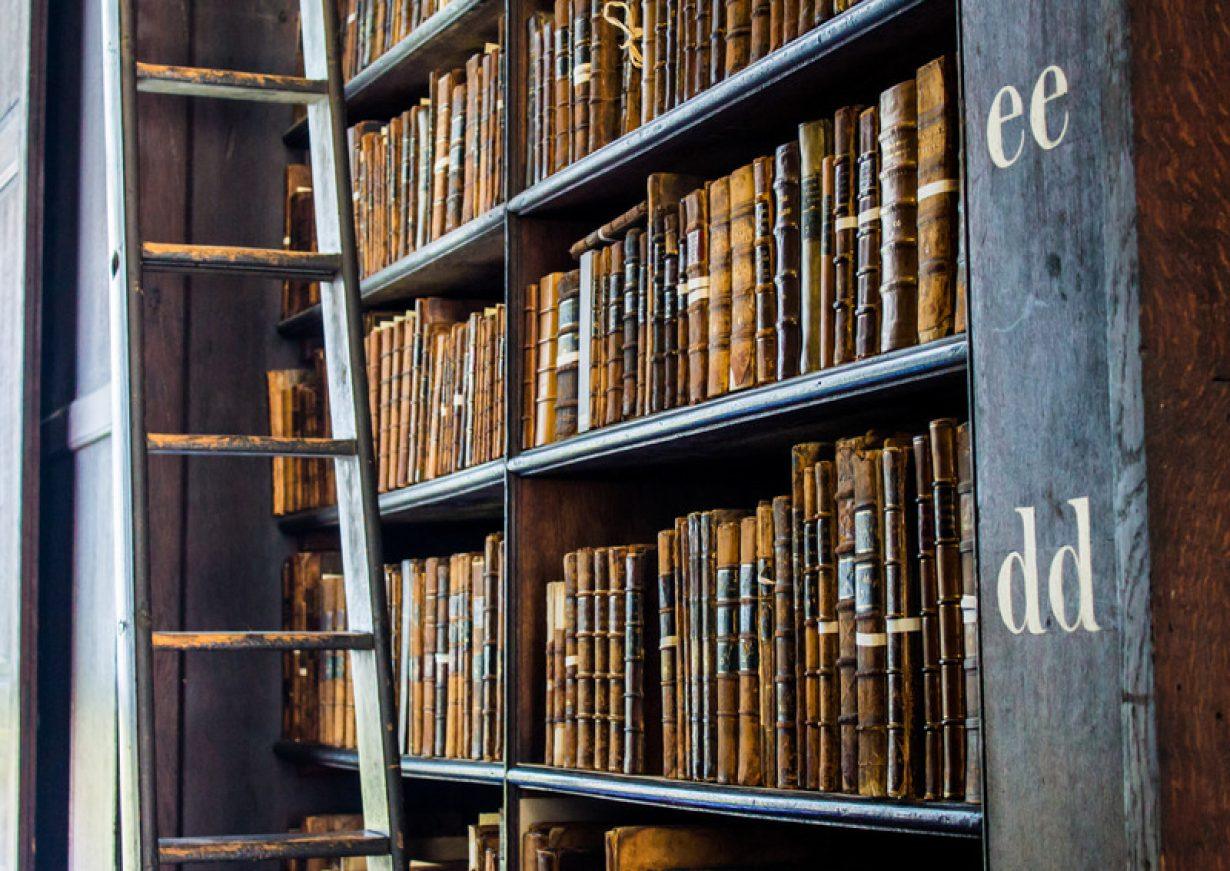 Bookshelves of an old library RFID Replace QR Codes at Library