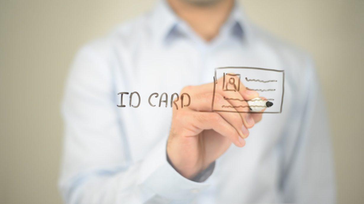 Id Card, Illustration , Man writing on transparent screen RFID University ID Cards and Triple DES Security