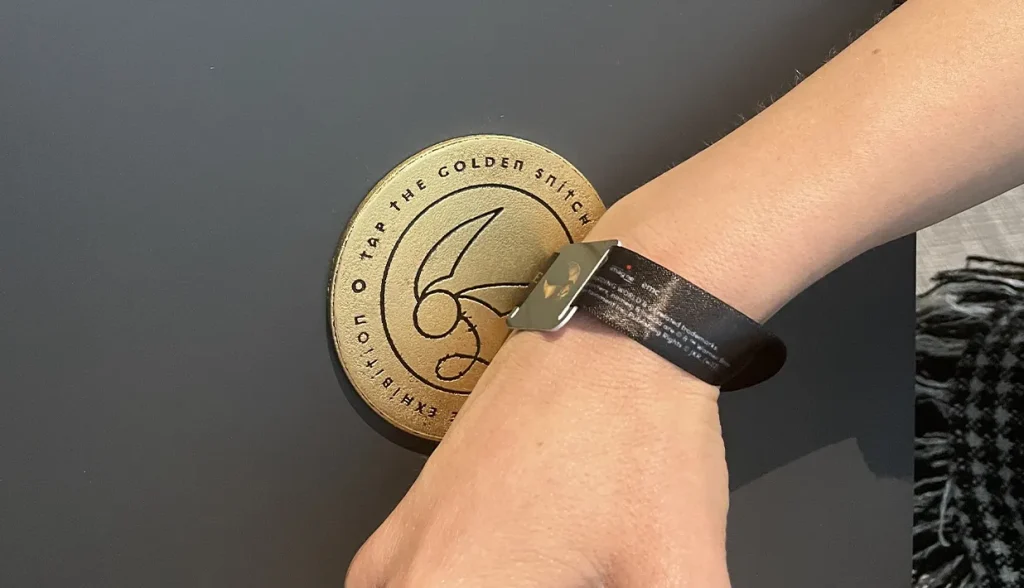 rfid-wristbands-in-harry-potter-exhibition-2022-1024x588-1 RFID wristbands used for interactive experiences at the 2022 Harry Potter Exhibition, providing seamless access and personalized features for attendees.